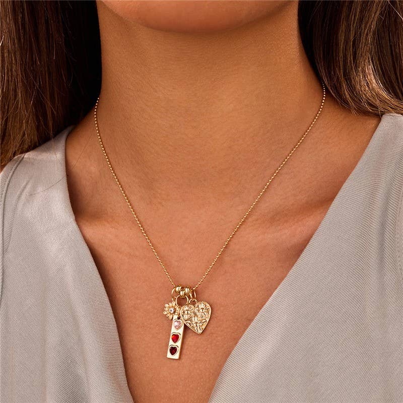 FLORAL HEART MULTI CHARM NECKLACE | 40NK9712