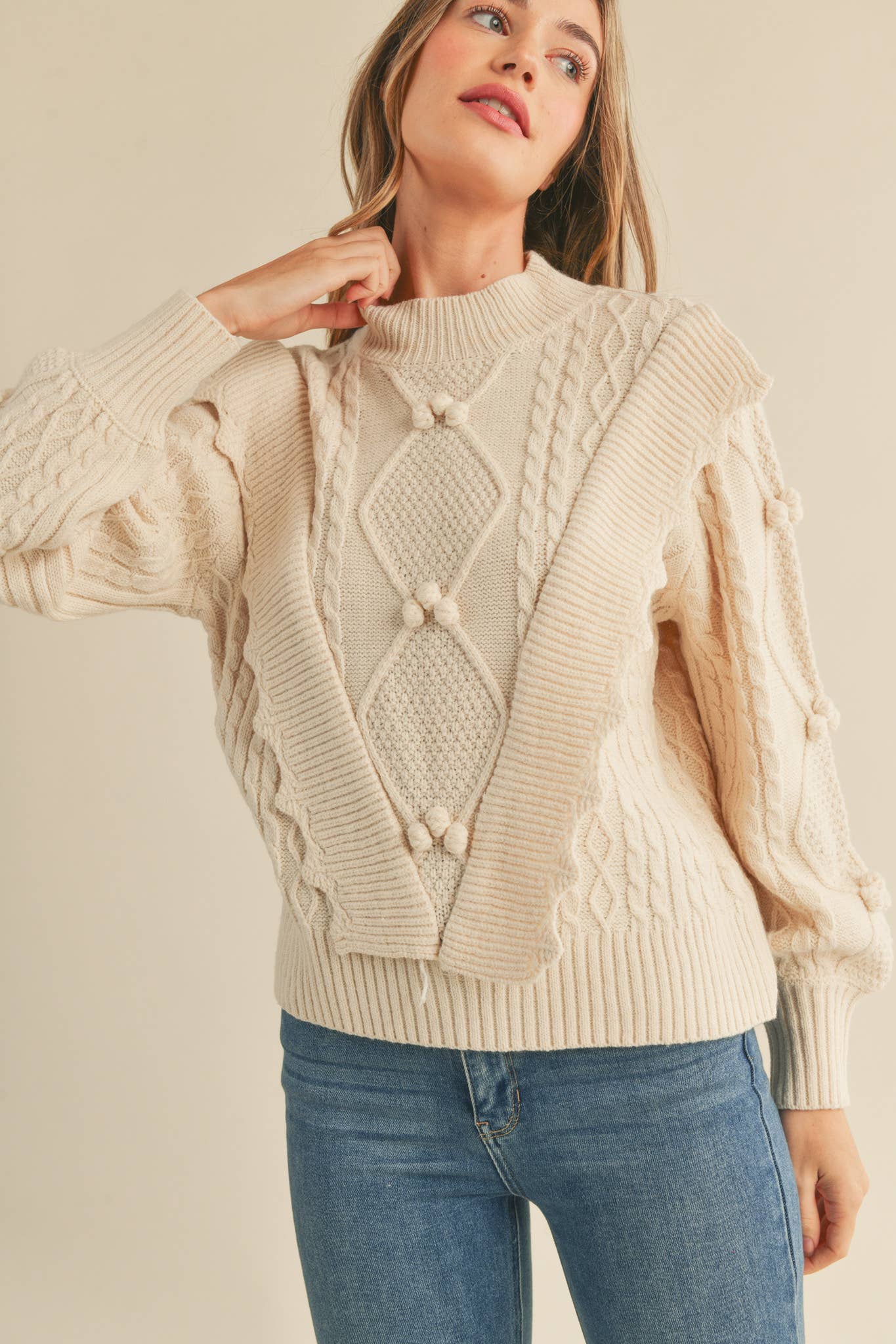 MOCK NECK CABLE KNIT PULLOVER WITH POM