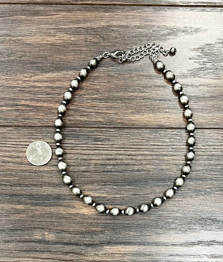 739100, Handmade 16" 10mm Oval Navajo Bead Necklace