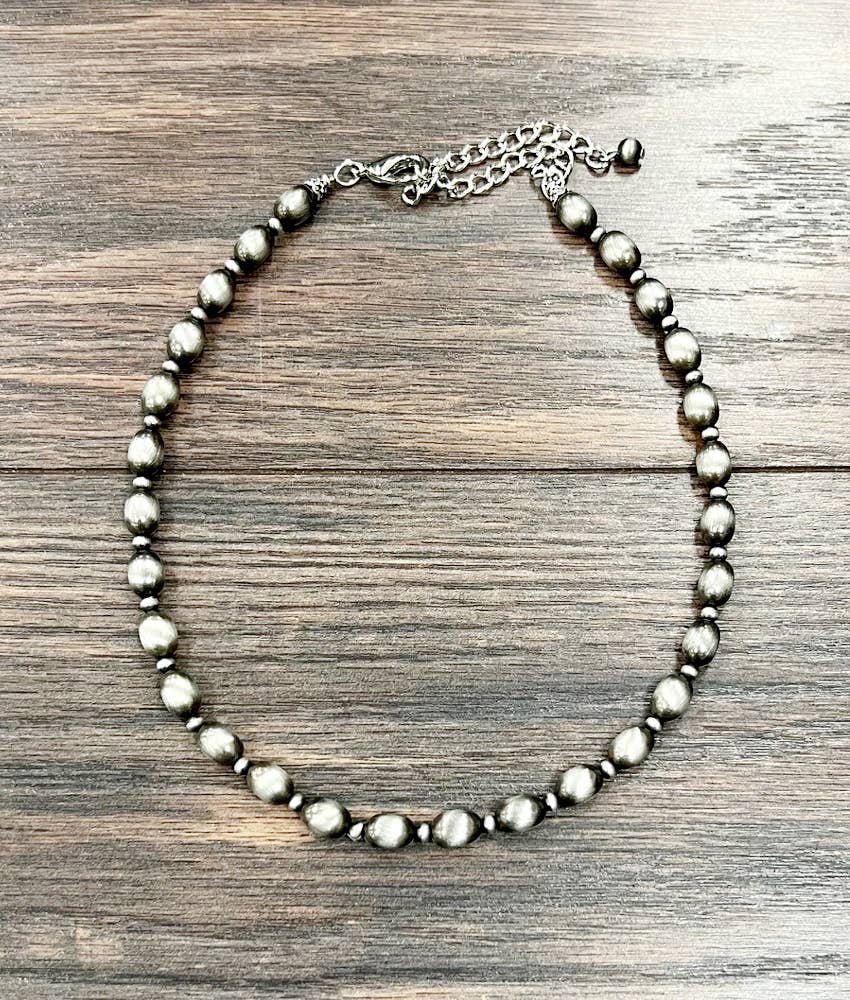 739100, Handmade 16" 10mm Oval Navajo Bead Necklace