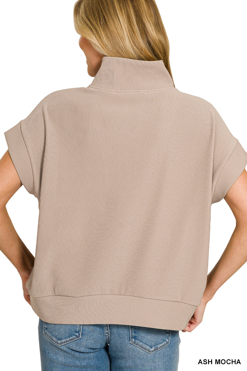 Ribbed high neck half zip top