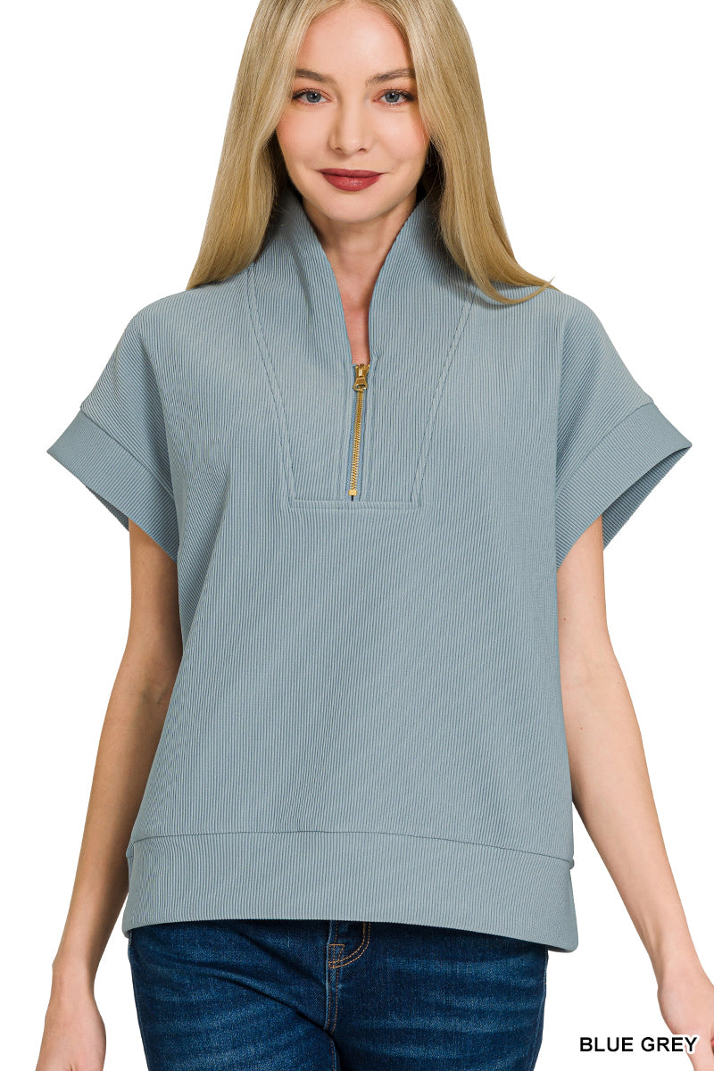 Ribbed high neck half zip top