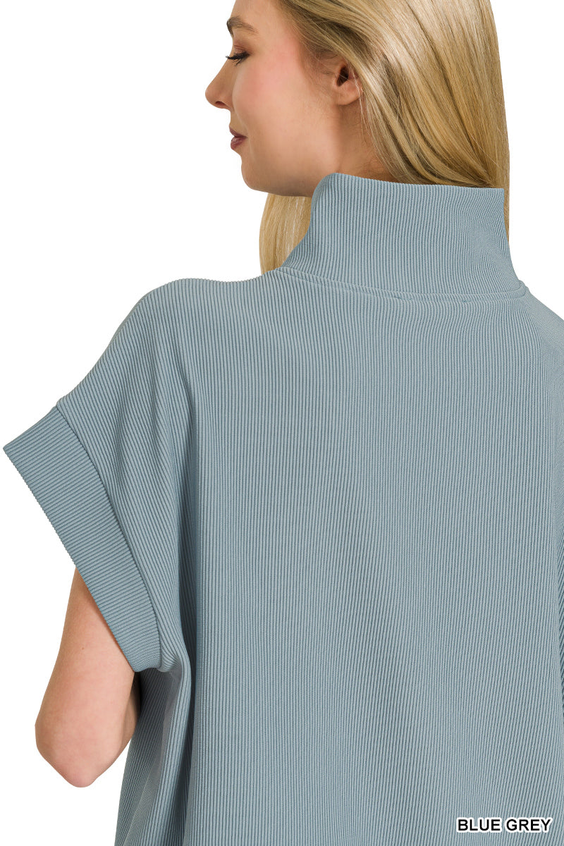 Ribbed high neck half zip top
