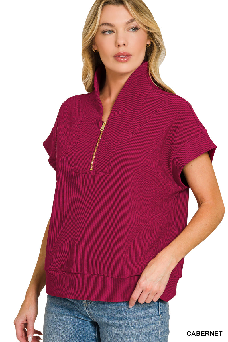 Ribbed high neck half zip top
