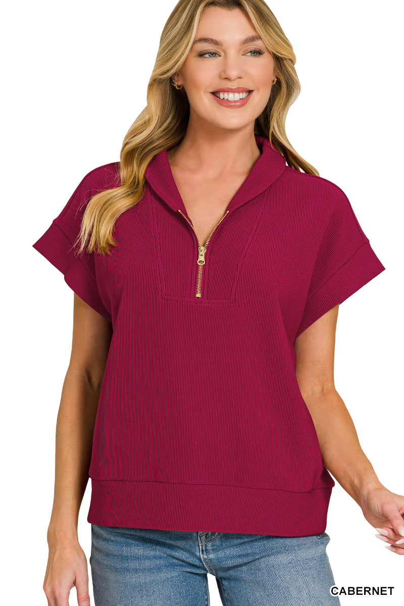 Ribbed high neck half zip top