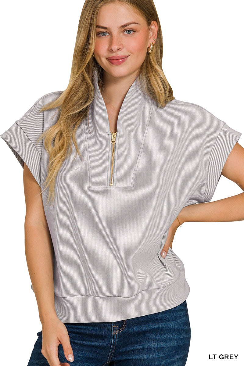 Ribbed high neck half zip top