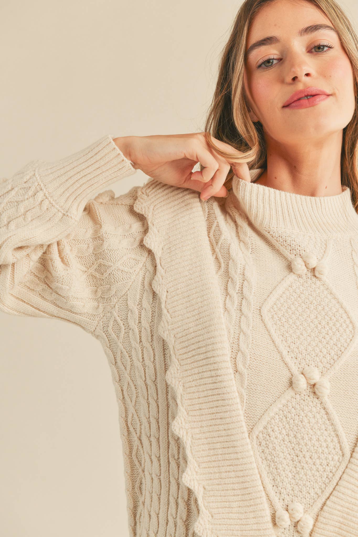 MOCK NECK CABLE KNIT PULLOVER WITH POM