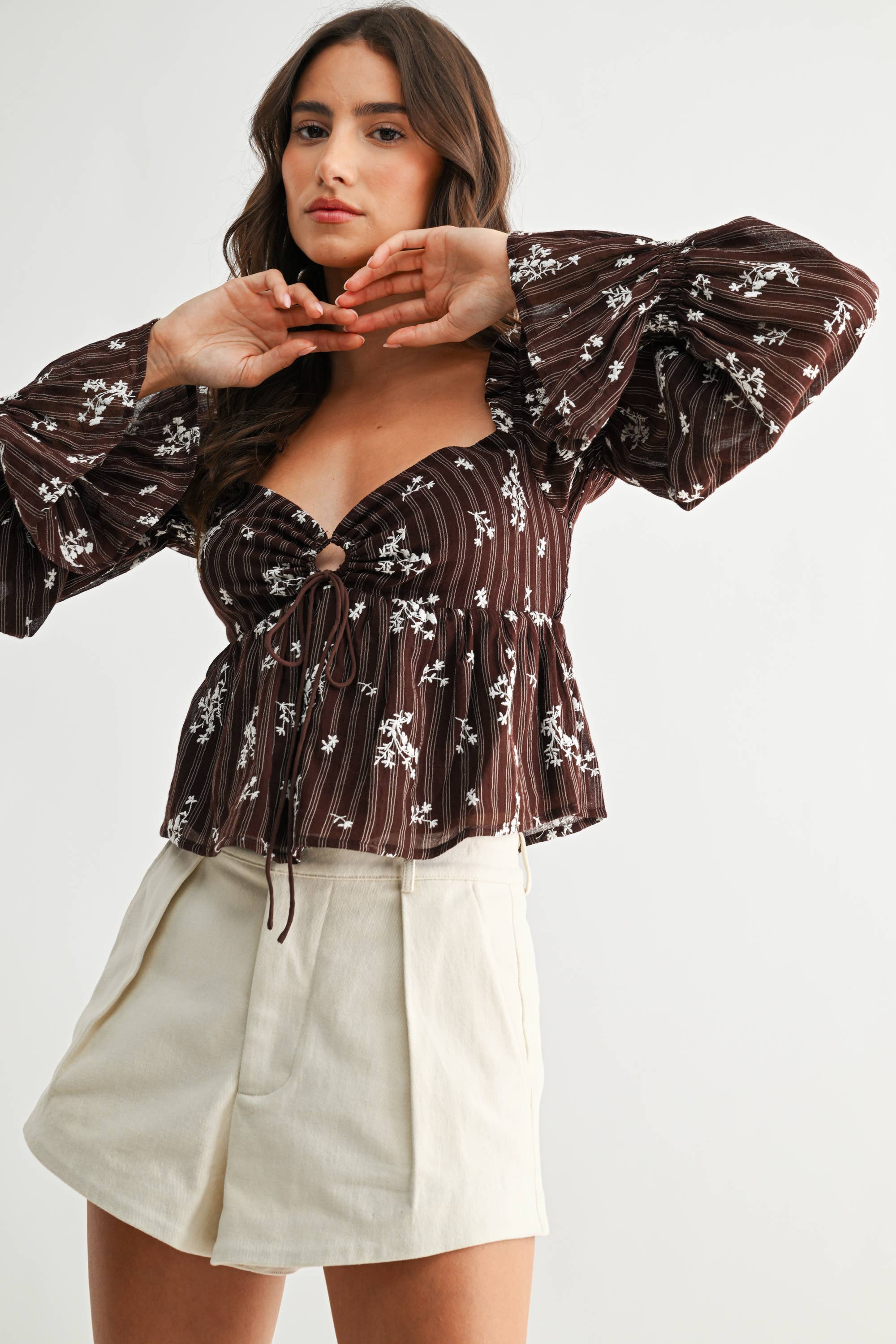 FLORAL TIE-FRONT PEPLUM TOP