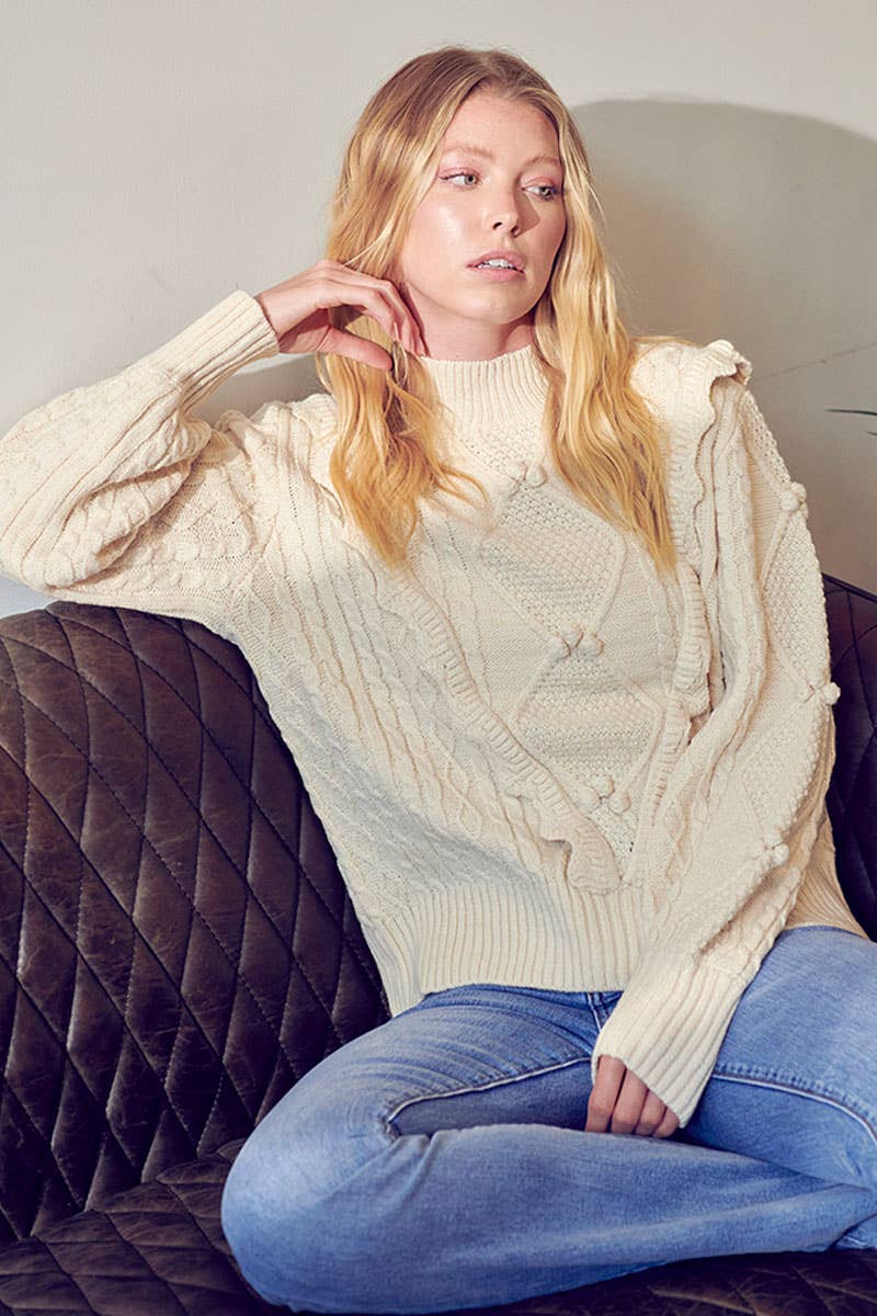 MOCK NECK CABLE KNIT PULLOVER WITH POM